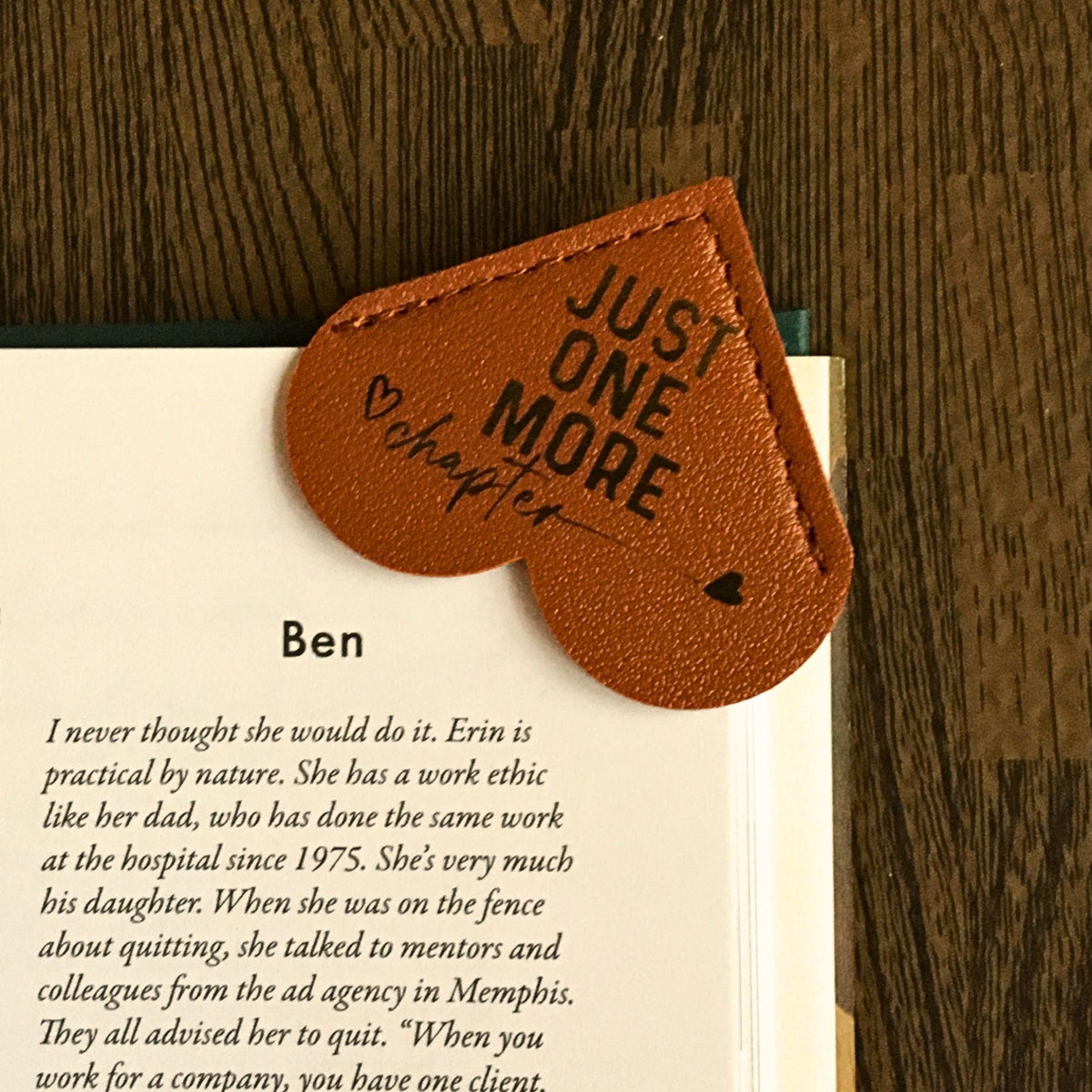 Brown leather bookmark with heart design from Heartfelt Gifts, perfect for book lovers and reading enthusiasts.