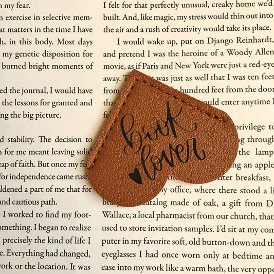 Leather heart-shaped bookmark for book lovers by Heartfelt Gifts, featuring a romantic heart design for reading enthusiasts.