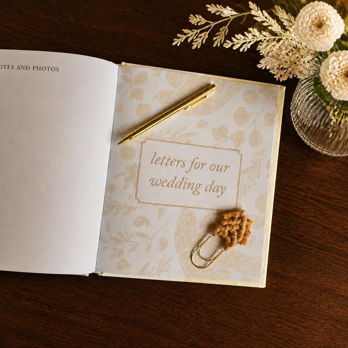 Styled letters on the Heartfelt Gifts engagement journal cover, featuring elegant calligraphy and romantic design elements.